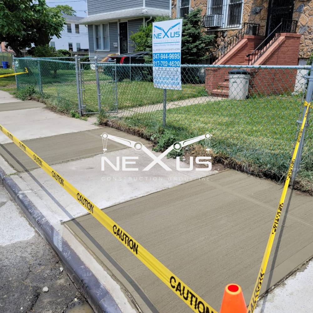 Sidewalk repaired and DOT violation resolved