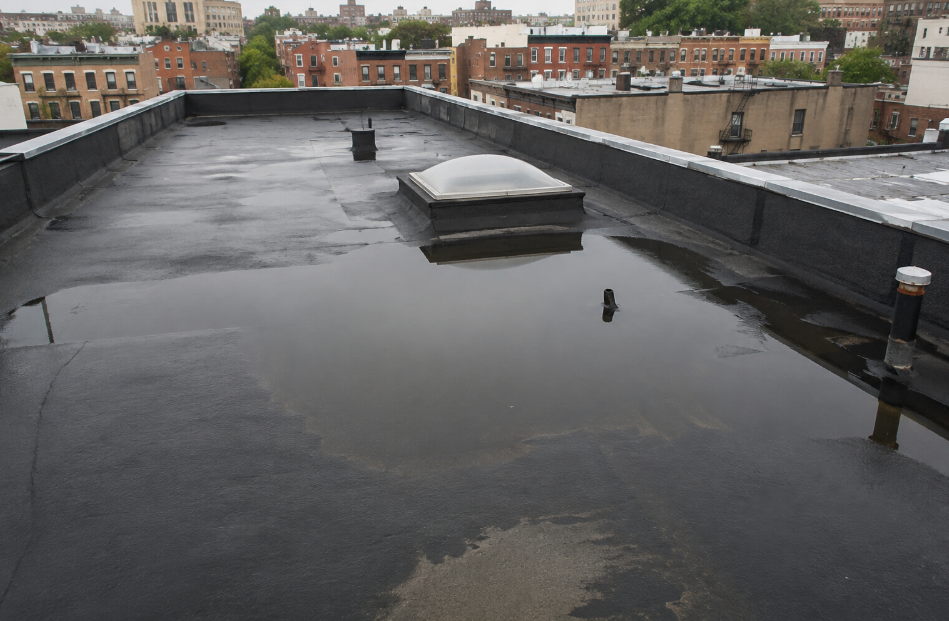 Commercial-grade flat roofing installation on NYC building by Nexus Construction Group Inc